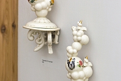 Bubble trophy “Cry if I want to” on porcelain shelf, 2012
