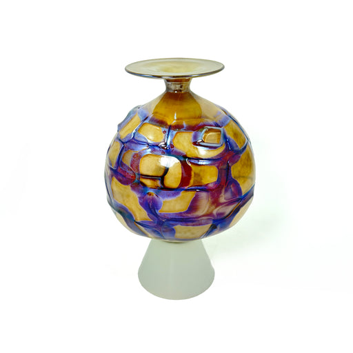 Decorative glass vase with colorful abstract pattern on a white background