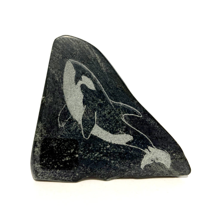 Orcas Etched on Stone