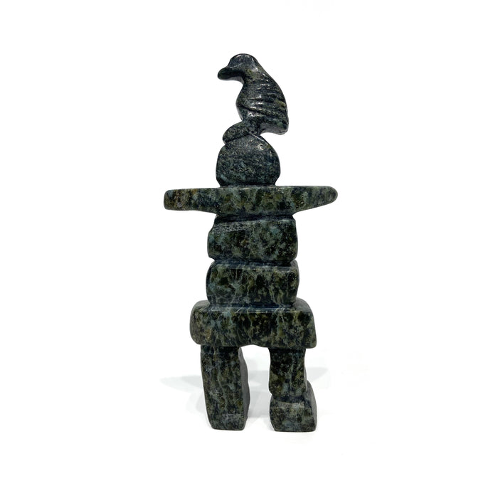 Bird Resting on an Inukshuk Carving