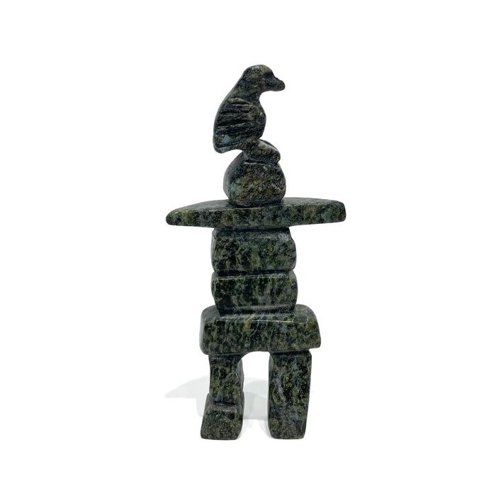 Bird Resting on an Inukshuk Carving