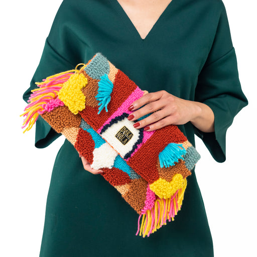 Dora Nola hand tuffted clutch