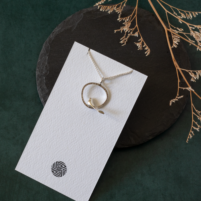 Bird in an Organic Shape Necklace