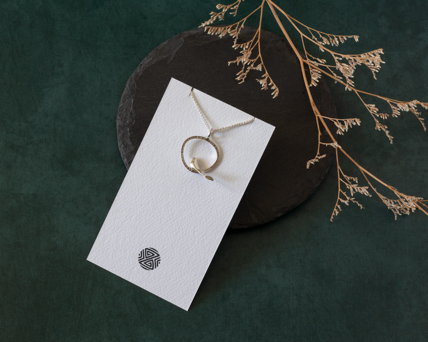 Bird in an Organic Shape Necklace