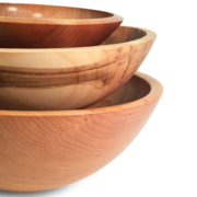 stack of wooden turned bowls in different woods